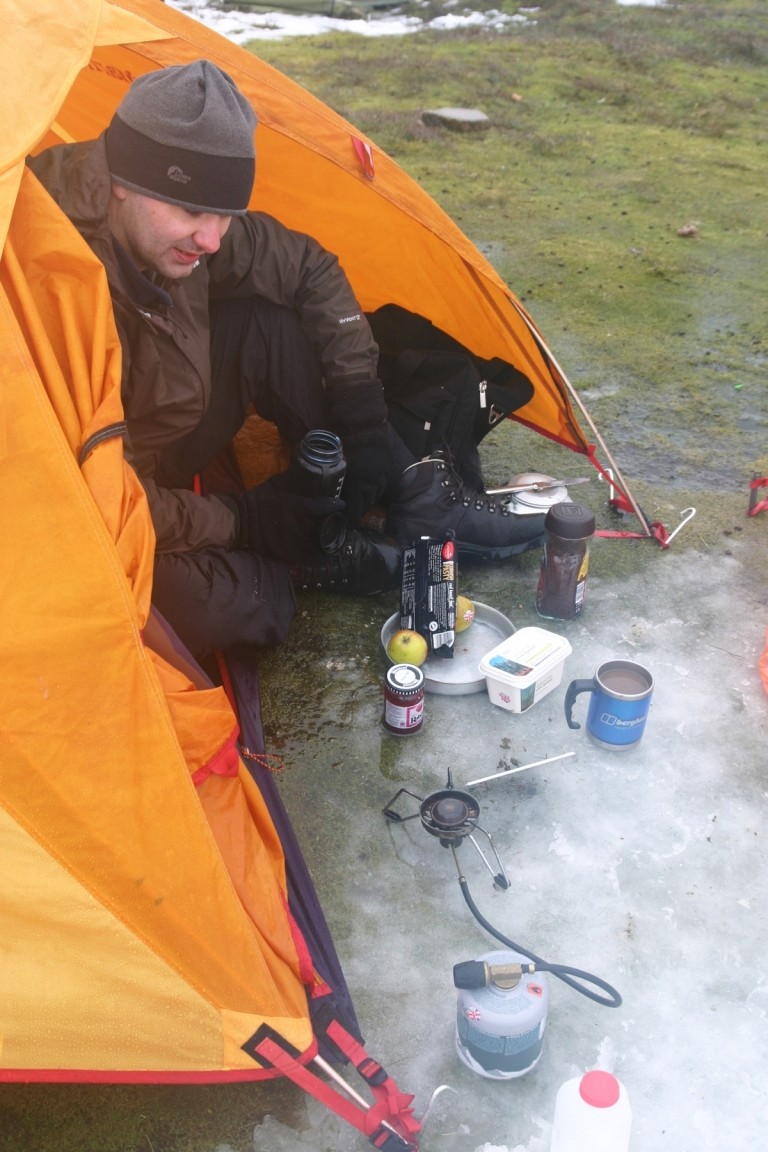 Richard And His Tent In A Big Puddle Of Thawed Snow